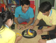 Students and visitors enjoy interacting at Big Sister Mouse school.