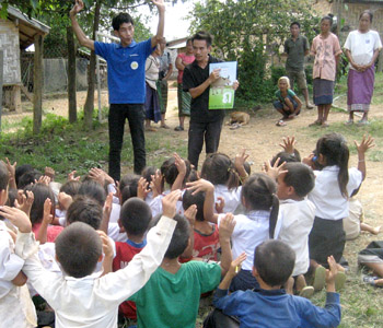 Briefly teaching Lao sign language at a rural Lao school