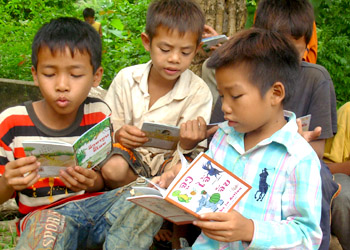 Kids enjoy their books, after listening to stories from teachers