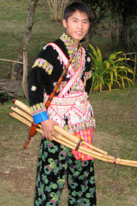 James with a kaen, a traditional musical instrument of Laos