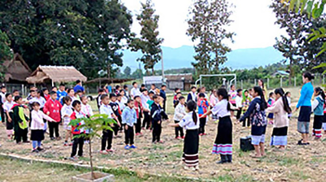 Morning dances provide fun exercise for children at Little Rabbit School in Muang Houn, Laos.